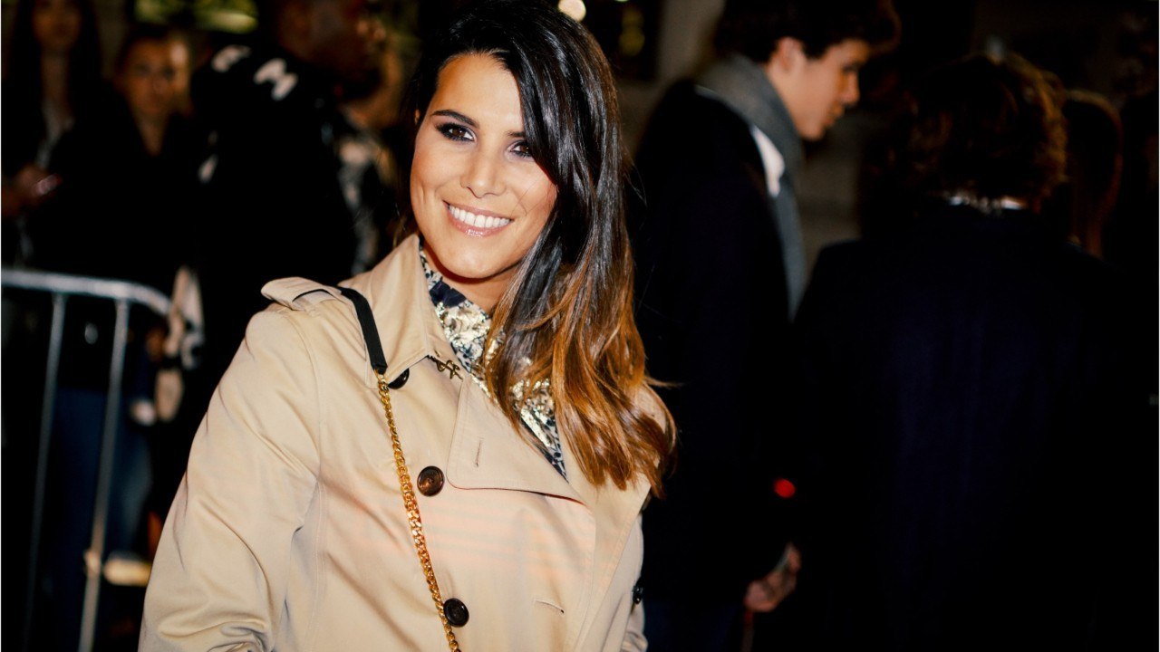 FEMME ACTUELLE  – Karine Ferri, en combishort et cuissardes, illumine la Fashion Week