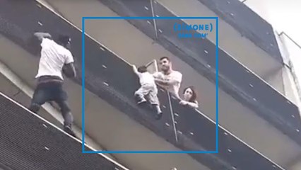 SIMONE: Un homme escalade un immeuble pour sauver un enfant