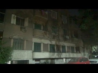 جيران المتهم بقتل أمين شرطة الزمالك يروون تفاصيل وفاة والده