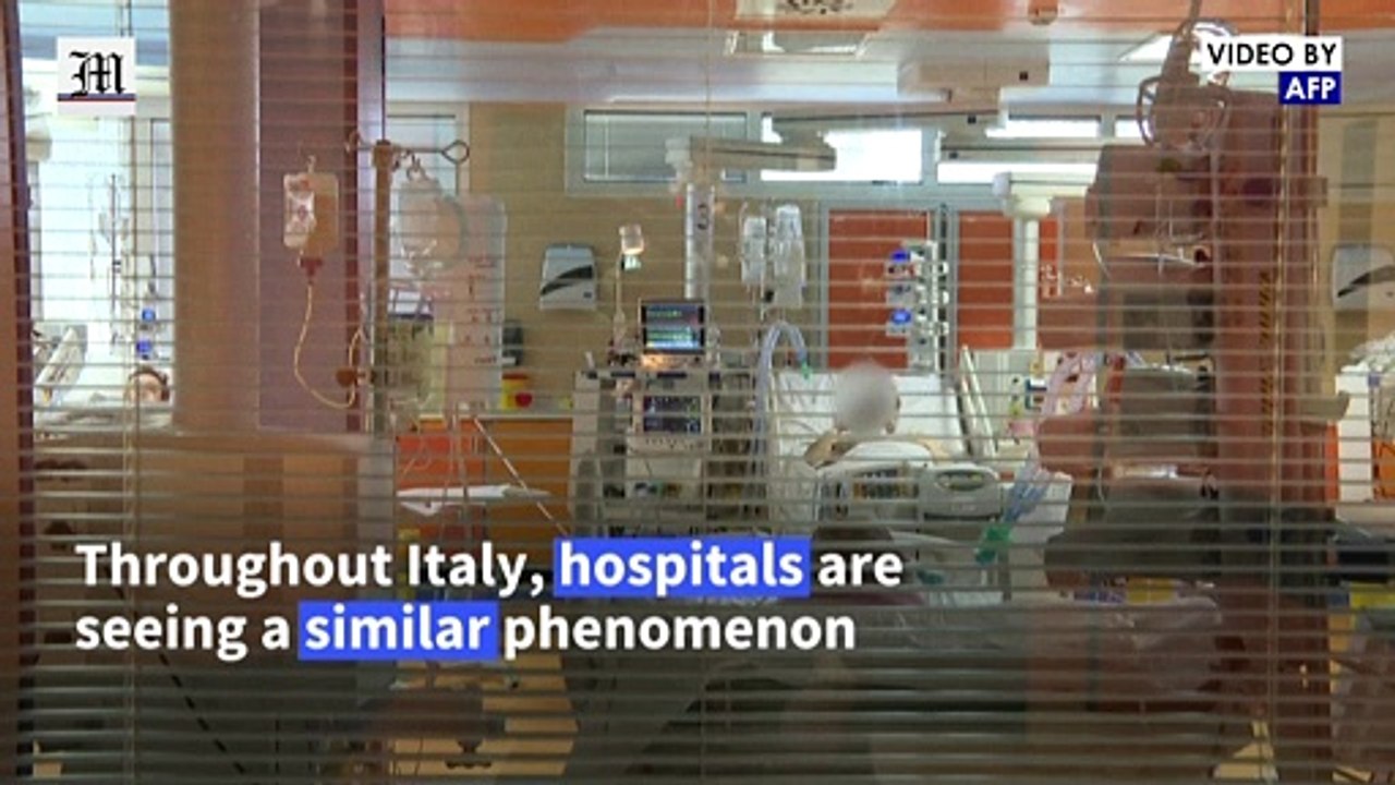 Italian hospitals under strain as Covid hits new highs