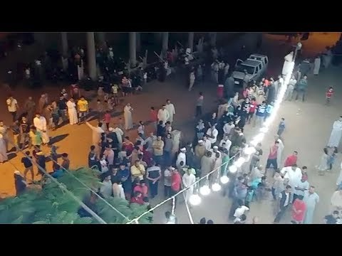 احتشاد أهالي قرية ميت حبيب انتظارا لوصول جثامين شهداء معهد الأورام