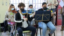 Spanish orchestra uses instruments made from recycled materials