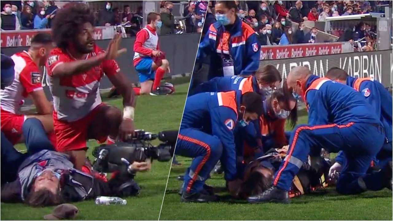 Un cameraman sort sur civière après avoir été percuté par un joueur