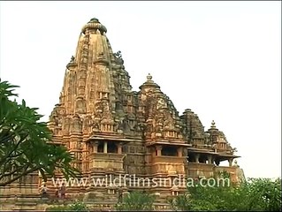 Erotic stone carvings on temple facade in Khajuraho