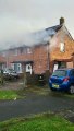 Firefighters tackling the blaze in Staveley Crescent