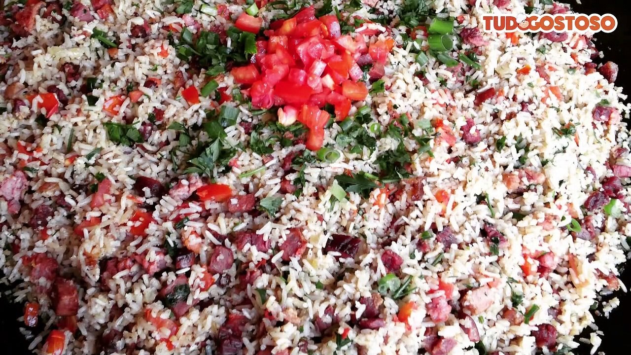 Arroz carreteiro no disco de arado