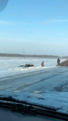 Car Stuck in Deep Snow after Blizzard