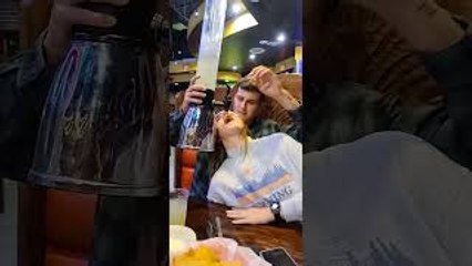 Girl Attempting to Chug Drink Tower Forgets to Swallow