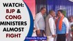 Karnataka: BJP’s Ashwath Narayan & Cong’s DK Suresh clash on stage in front of CM | Oneindia News