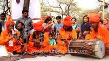 Folk musician compiling beats with traditional instruments at Surajkund Mela 2013
