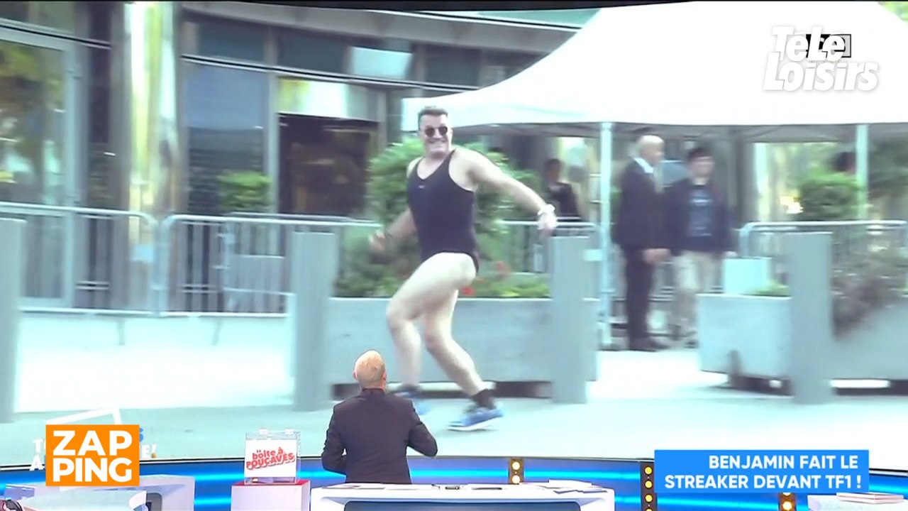 Benjamin Castaldi défile en maillot de bain devant la tour TF1