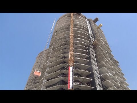 ناطحات سحاب .. وزير الإسكان يضع حجر أساس 5 أبراج سكنية بالعلمين الجديدة