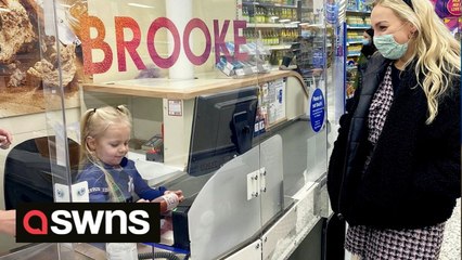 Four-year-old Tesco super-fan is given a custom-made uniform by the supermarket and is even offered a shift at the tills