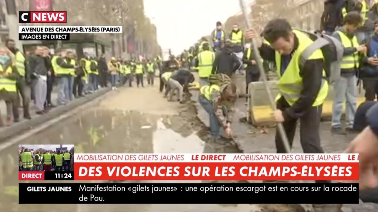 Gilets jaunes : armés de pioches, des casseurs descellent les pavés des  Champs-Elysées - Vidéo Dailymotion