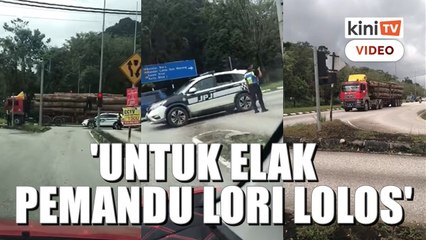 Video herunterladen: Kenderaan JPJ iring nak elak pemandu lolos, bukan 'lindungi' lori balak