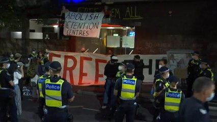 World number one spends night in immigration detention