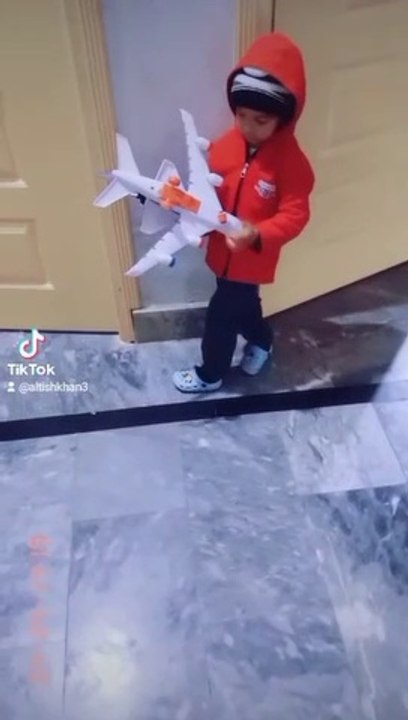 Kids play aeroplane