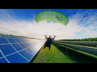Paramotor Cruising Low Over Solar Farm