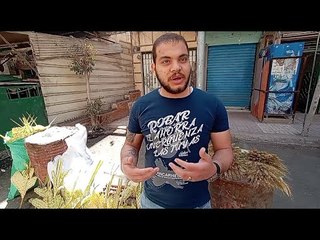 كيرلس يعود لبيع السعف أمام الكنائس بعد 365 يوما غياب