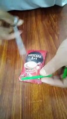 nescafe coffee and drinking straw.