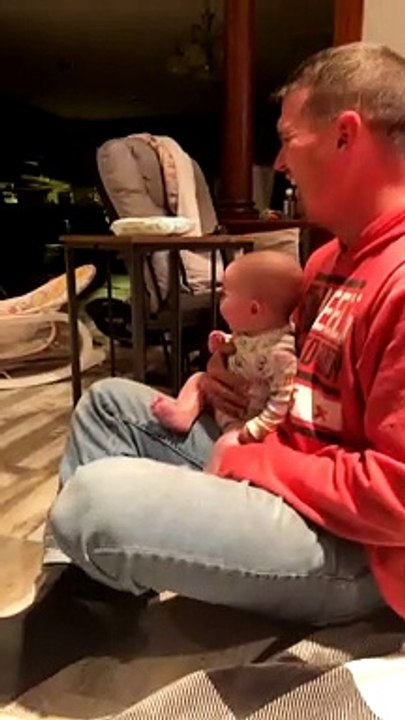 Baby Laughing Hard at Dog Playing Fetch