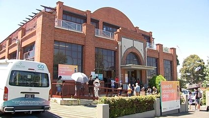 Victoria mandates third booster shot for critical workers as hospitalisation spike