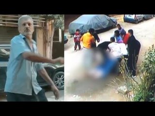 رجل يضـ رب سيدة أمام طفلها في الشارع بـلا رحـمة.. والأم تستغيث
