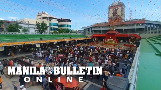 Devotees light up candles and offer prayers to the image of Sto. Niño in Cebu City