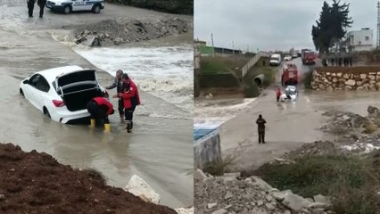 Aracını kurtarmak isterken akıntıya kapılan sürücü ölümden döndü
