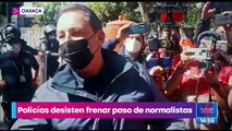 Policías desisten en el frenar paso de normalistas en Oaxaca