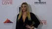 Cassie Scerbo attends the ‘Redeeming Love’ film premiere red carpet in Los Angeles