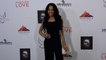 Teala Dunn attends the ‘Redeeming Love’ film premiere red carpet in Los Angeles