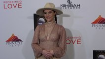 Jade Patteri attends the ‘Redeeming Love’ film premiere red carpet in Los Angeles