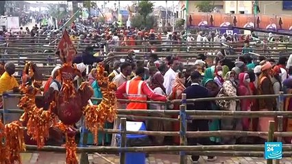 Hundreds of thousands of Indians gather for holy dip, defying Covid-19 surge