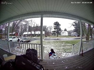 Icy Stairs Cause Christmas Presents to go Flying