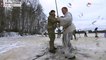 British soldiers jump into the icy water in Estonia.