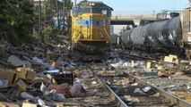 LA train tracks blanketed with empty boxes as thieves loot cargo