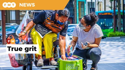 Ex-swim champ not looking for govt handouts, takes to the streets to stay self-sufficient