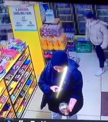 Fotoğrafını çektiği içkiyi montuna saklayıp çaldı