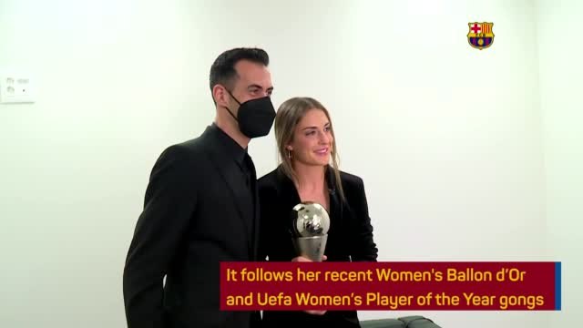 Barca captain Busquets presents Putellas with Best FIFA award