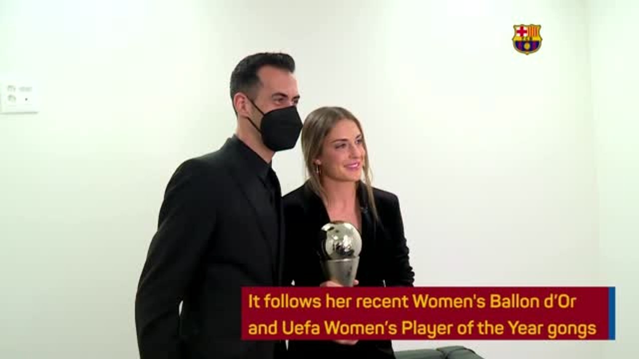 Barca captain Busquets presents Putellas with Best FIFA award