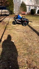Boy Drives Power Wheels to Get Mail