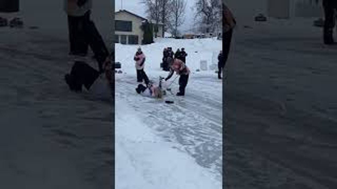 Curling Player Takes Hard Fall on Ice