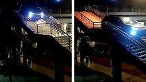 Un automobiliste passe par un escalier