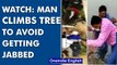 Boatman refuses Covid jab, attacks health worker; another climbs tree in UP's Ballia | Oneindia News