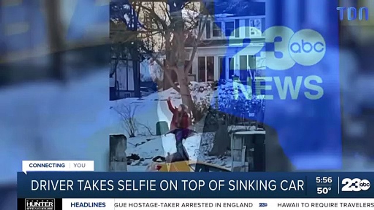 Sa voiture coule dans un lac gelé, elle prend un selfie sur le capot