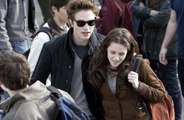 Robert Pattinson was “so into” Kristen Stewart he fell off the bed while auditioning for ‘Twilight’.