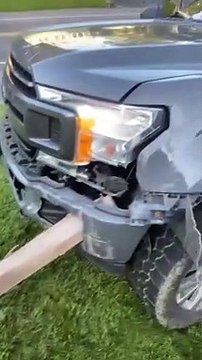 Truck Impaled by Fence Post