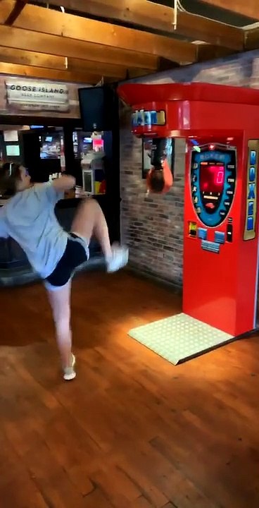 Why You Shouldn't Try to Kick a Punching Bag
