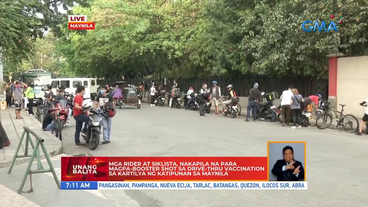 Riders at cyclists, pinilahan ang booster drive-thru vax site sa Maynila | UB